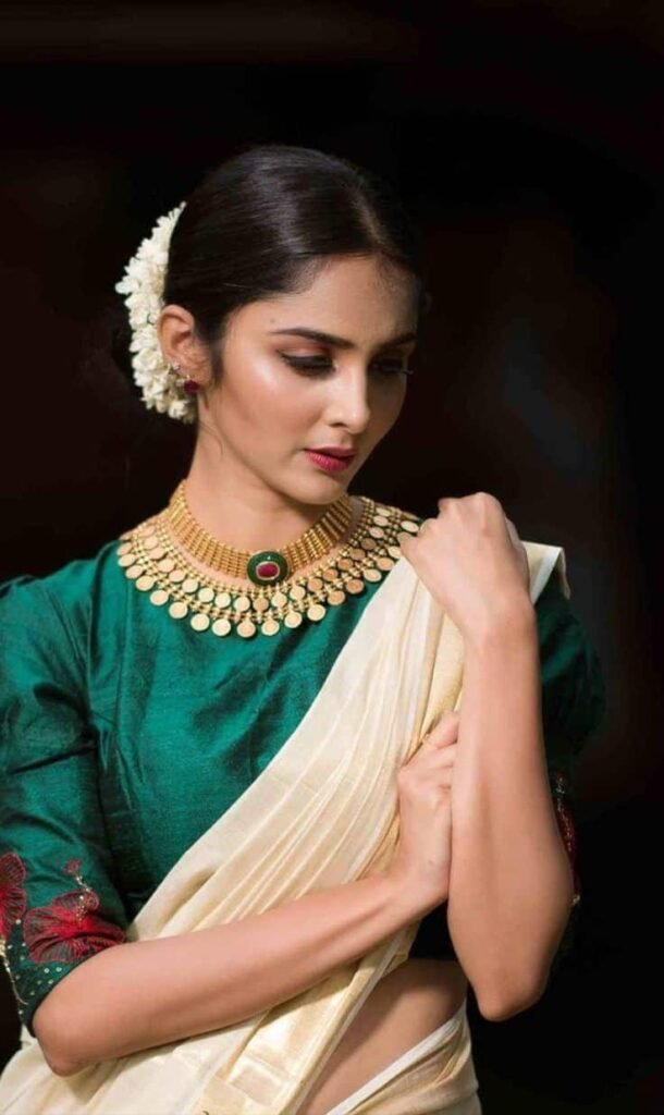 Boat Neck Kerala Saree Blouse Designs